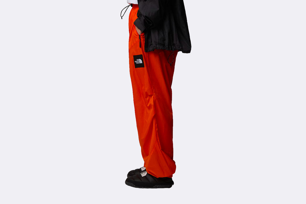 The North Face X Yinka Ilori Wind Pant Red Orange